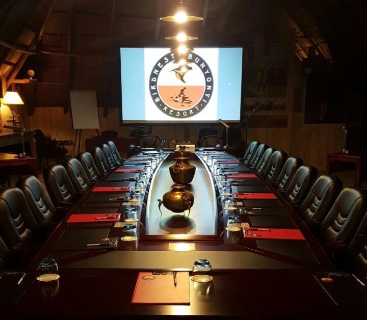 High-Tech Conference Hall under a Thatched Roof